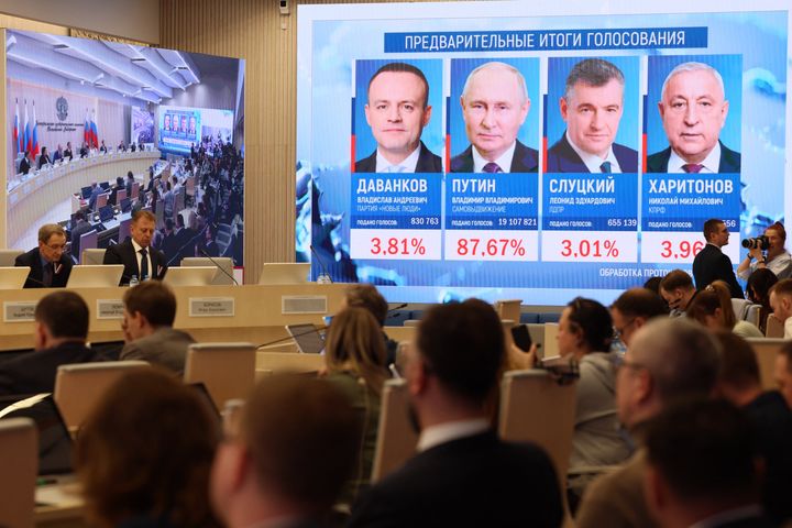 Preliminary voting results in the Russian presidential election are displayed on a screen at the Central Election Commission in Moscow on March 17, 2024. Vladimir Putin secured 88 percent of the first votes counted in Russia's presidential election, the head of Russia's election commission said on March 17, 2024. (Photo by STRINGER / AFP) (Photo by STRINGER/AFP via Getty Images)
