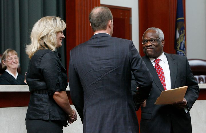 Justice Clarence Thomas swears in Utah Supreme Court Justice Thomas R. Lee at the Matheson Courthouse in Salt Lake City on July 19, 2010. 