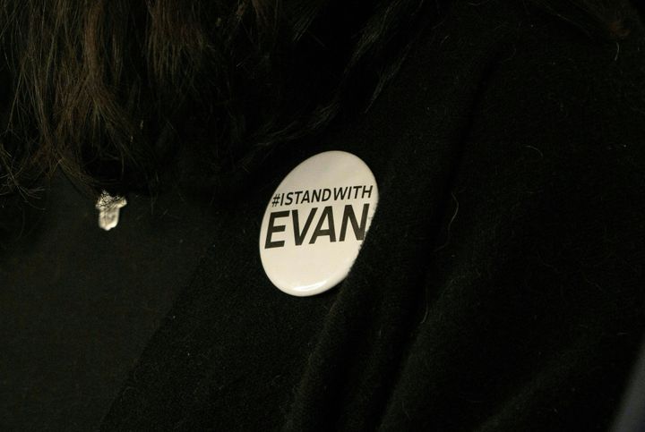 Danielle Gershkovich, Evan Gershkovich's sister, wears a pin reading #IStandWithEvan during a video interview in her apartment in Philadelphia on Feb. 27, 2024.