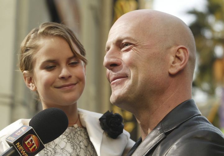 Tallulah Willis and her father, Bruce Willis, at the 2004 premiere of "The Whole Ten Yards" in Los Angeles. The fashion designer recently shared that she's autistic.