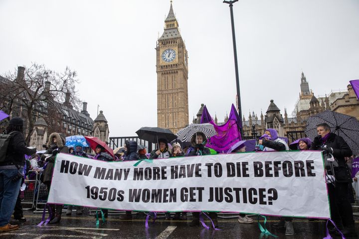 Women from the WASPI (Women Against State Pension Inequality) campaign assemble outside parliament.