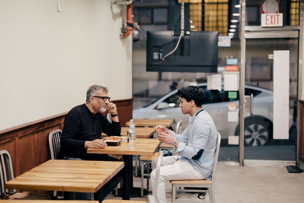 Shahed Amanullah and Arman Khwaja, founder and owner of Zabihah, the world's largest guide to halal eateries and markets for Muslims, breaking their fast in a Halal restaurant on March 18, 2024 in Manhattan.