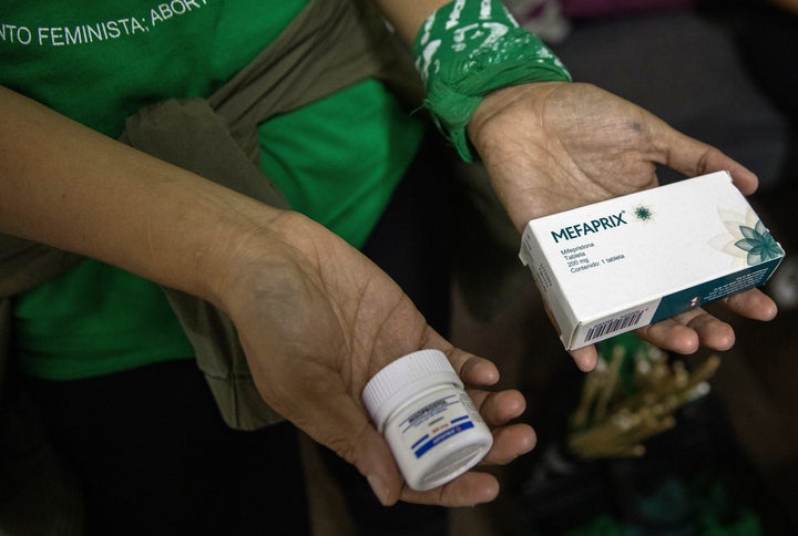 Crystal Perez Lira shows medicine used for an abortion protocol during an interview at the reproductive rights organization "Colectiva Bloodys y Projects," in Tijuana, Mexico, on Thursday, Sept. 28, 2023.