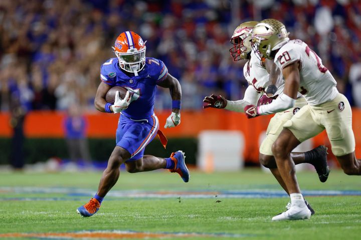 Trevor Etienne runs the ball when he played for Florida last season before transferring to Georgia.