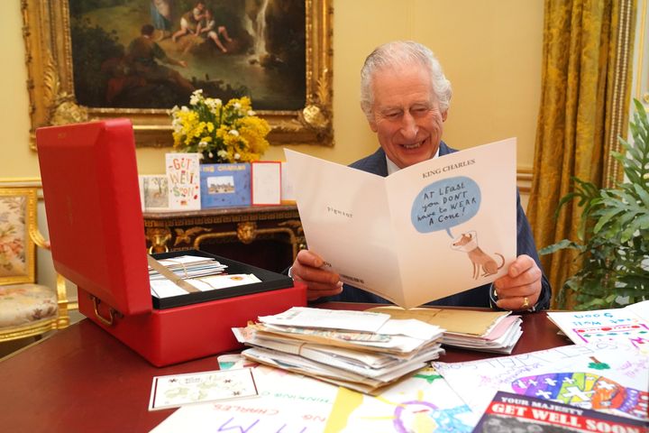 Charles reads cards and messages sent by well-wishers following his cancer diagnosis. The cancer was discovered after a procedure the king underwent for an enlarged prostate. 