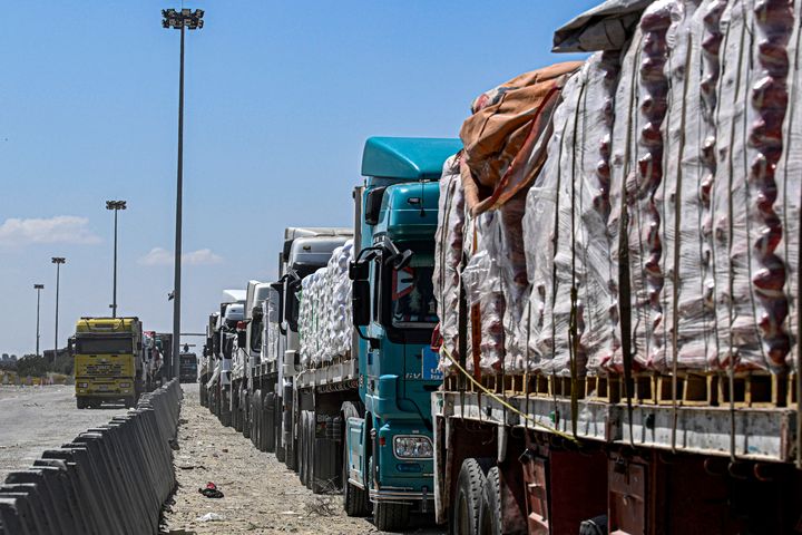 Egyptian trucks carrying humanitarian aid bound for the Gaza Strip outside the Rafah border on March 23, amid the ongoing conflict in the Palestinian territory between Israel and the Palestinian militant group Hamas.