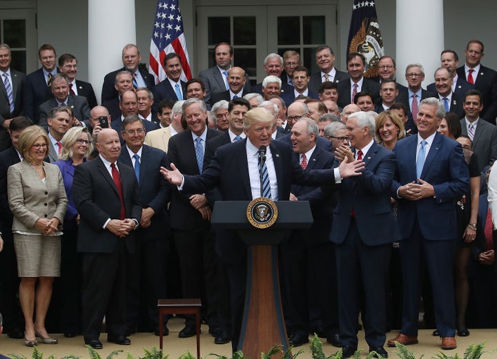 It's been a few years since former President Donald Trump, seen here rallying House Republicans at the White House in 2017, tried to repeal the Affordable Care Act. President Joe Biden wants to make sure Americans remember.