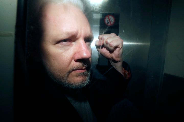 WikiLeaks founder Julian Assange being taken from court, where he appeared on charges of jumping British bail seven years ago, in London, on May 1, 2019.