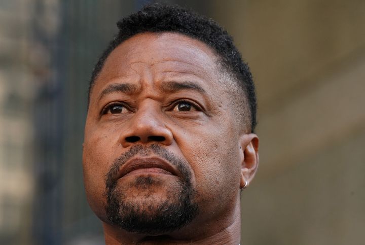Cuba Gooding Jr. leaves an October 2019 court arraignment in New York. He is now implicated in a sexual assault lawsuit filed against Sean "Diddy" Combs and associates.