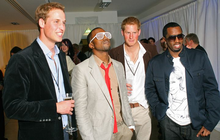 Prince Harry and his brother, Prince William, pose with rappers Sean "Diddy" Combs and Kanye West during a 2007 concert celebrating the princes' late mother, Princess Diana.