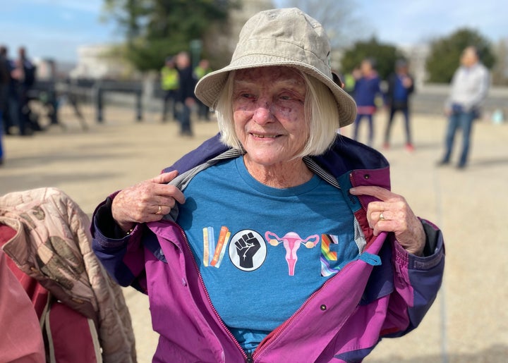 Susan of Chapel Hill, North Carolina, shows off her T-shirt spelling out V-O-T-E.