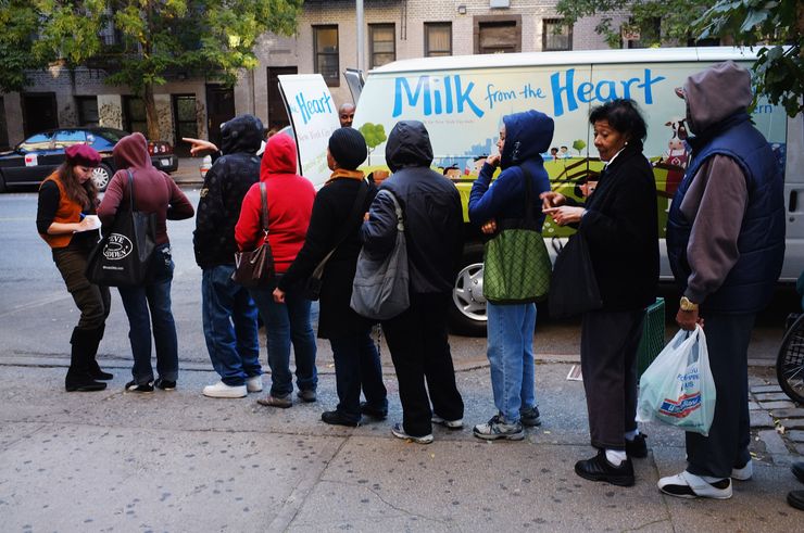 The Milk from the Heart program makes weekly deliveries to Washington Heights and 12 other locations in Manhattan and the Bronx on Oct. 6, 2011, in New York City. 