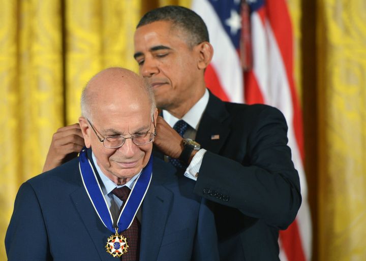 US President Barack Obama presents the Presidential Medal of Freedom to psychologist Daniel Kahneman during a ceremony in the East Room of the White House on November 20, 2013 in Washington, DC. The Medal of Freedom is the country's highest civilian honor. AFP PHOTO/Mandel NGAN (Photo credit should read MANDEL NGAN/AFP via Getty Images)