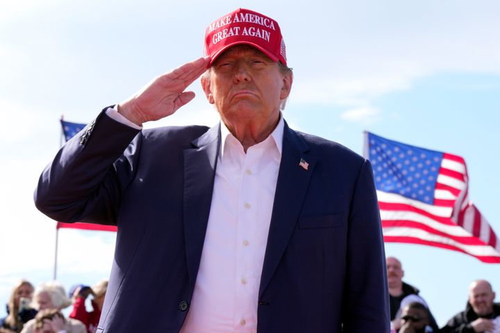Republican presidential candidate Donald Trump salutes at a campaign rally March 16 in Vandalia, Ohio. Trump is making the Jan. 6, 2021, attack on the U.S. Capitol a cornerstone of his bid to return to the White House. 