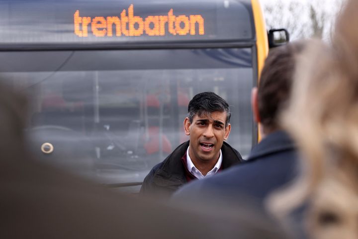 Britain's Prime Minister Rishi Sunak speaks to employees during the launch of their local elections campaign, at a bus depot in Heanor, northern England on March 22, 2024. (Photo by Darren Staples / POOL / AFP) (Photo by DARREN STAPLES/POOL/AFP via Getty Images)