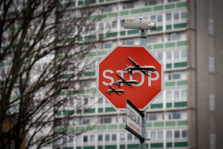 Banksy stenciled military drones on a stop sign in south London in December.