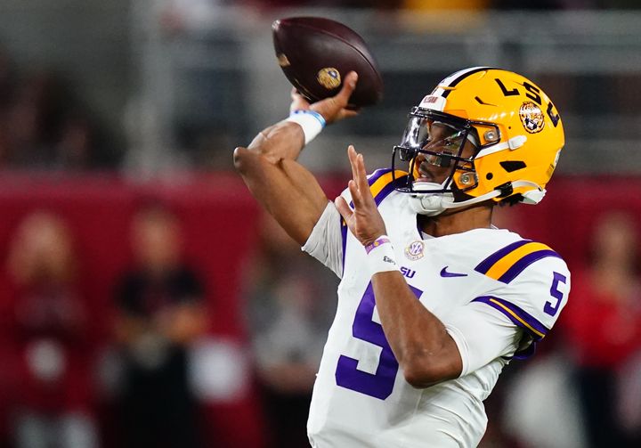 LSU Tigers quarterback Jayden Daniels throws a pass in a game against the Alabama Crimson Tide in Tuscaloosa.