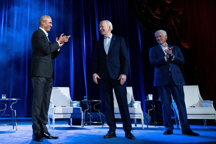 Former US President Barack Obama (L) and former US President Bill Clinton (R) clap for US President Joe Biden during a campaign fundraising event at Radio City Music Hall in New York City on March 28, 2024. (Photo by Brendan Smialowski / AFP) (Photo by BRENDAN SMIALOWSKI/AFP via Getty Images)