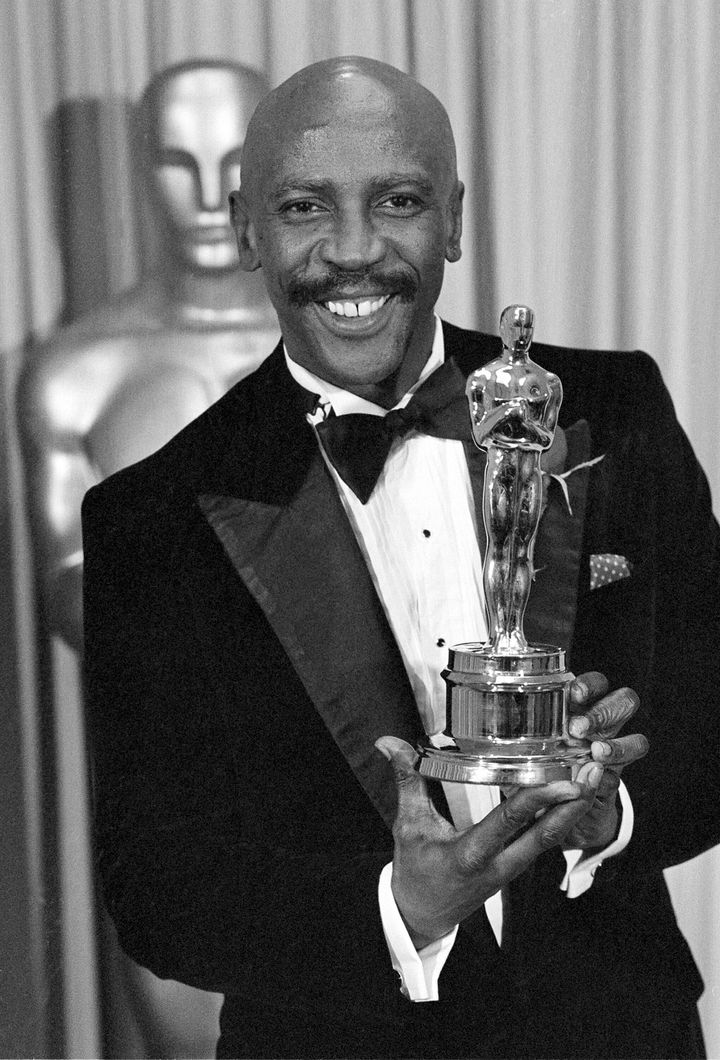 Louis Gossett Jr., poses with the Oscar for best supporting actor for his role in "An Officer and a Gentleman," at the annual Academy Awards presentation in Los Angeles on April 11, 1983. (AP Photo, File)