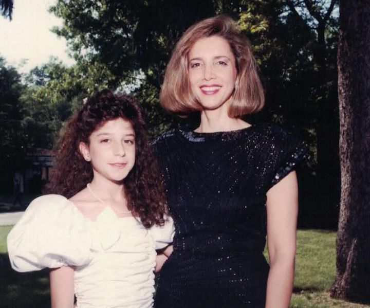 "Here I am rocking a perm, with my mother, at a Bat Mitzvah," the author writes.