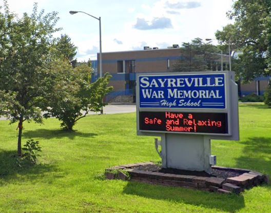 A 9-year-old boy was found dead inside a burning car behind Sayreville War Memorial High School.