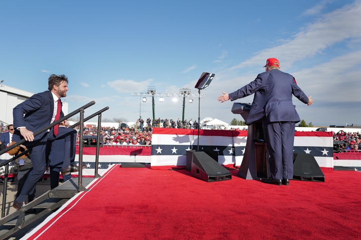 VANDALIA, OHIO - MARCH 16: U.S. Senator J.D. Vance (R-OH) steps on stage as he is introduced by Republican presidential candidate former President Donald Trump during a rally at the Dayton International Airport on March 16, 2024 in Vandalia, Ohio. The rally was hosted by the Buckeye Values PAC. (Photo by Scott Olson/Getty Images)