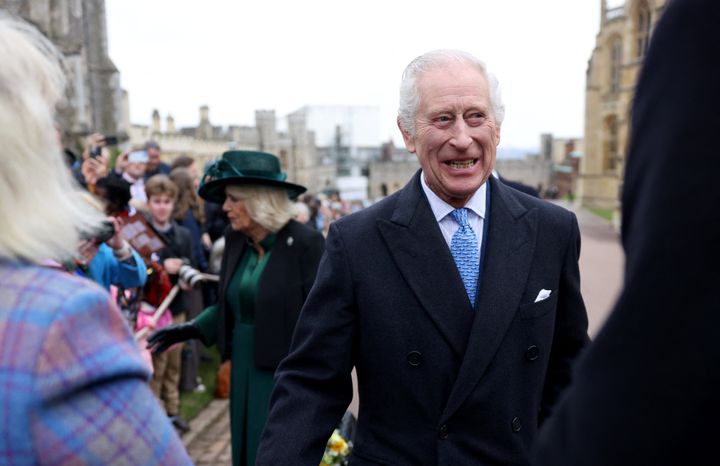 King Charles III and Queen Camilla greet people after attending the Easter Matins Service at St. George's Chapel, Windsor Castle, on March 31 in Windsor, England.