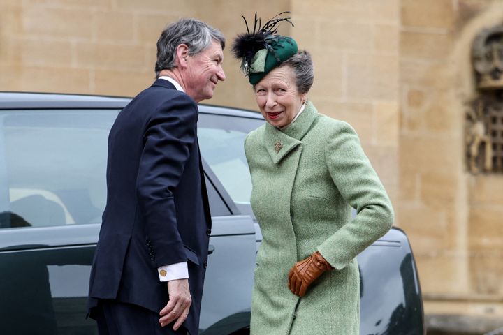 Princess Anne and Vice Admiral Timothy Laurence react upon their arrival at St. George's Chapel on March 31.