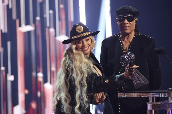 Beyoncé accepts the Innovator Award from Wonder at the 2024 iHeartRadio Music Awards on April 1. Wonder played harmonica on Beyoncé's "Jolene" cover from her new album, "Cowboy Carter."