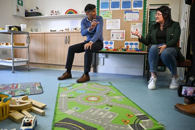 Rishi Sunak speaks to parents during a visit to Aldersyde Day Nursery in Hartlepool.