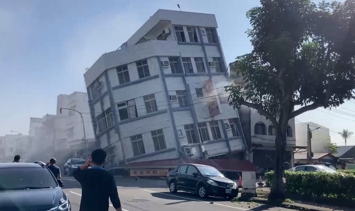 In this image taken from a video footage run by TVBS, a partially collapsed building is seen in Hualien, eastern Taiwan on Wednesday, April 3, 2024. A powerful earthquake rocked the entire island of Taiwan early Wednesday, collapsing buildings in a city and creating a tsunami that washed ashore on Japanese islands. (TVBS via AP)