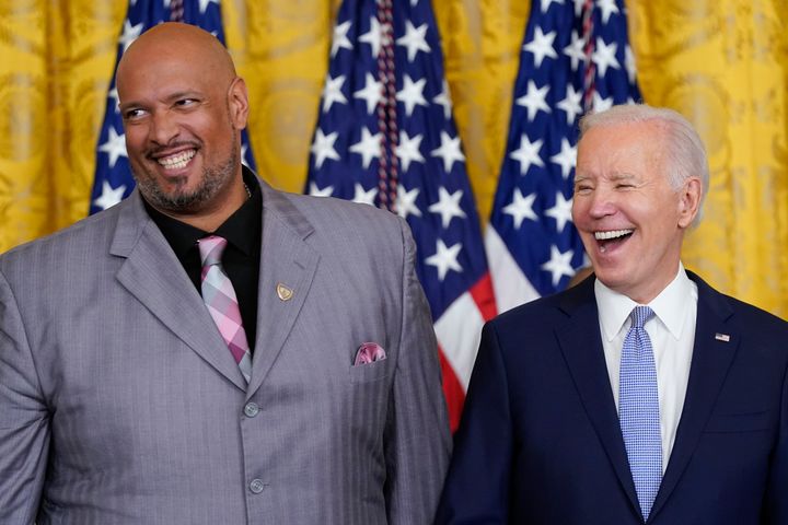 Harry Dunn (left) stands beside President Joe Biden before receiving the Presidential Citizens Medal, the nation's second-highest civilian honor, on Jan. 6, 2023.