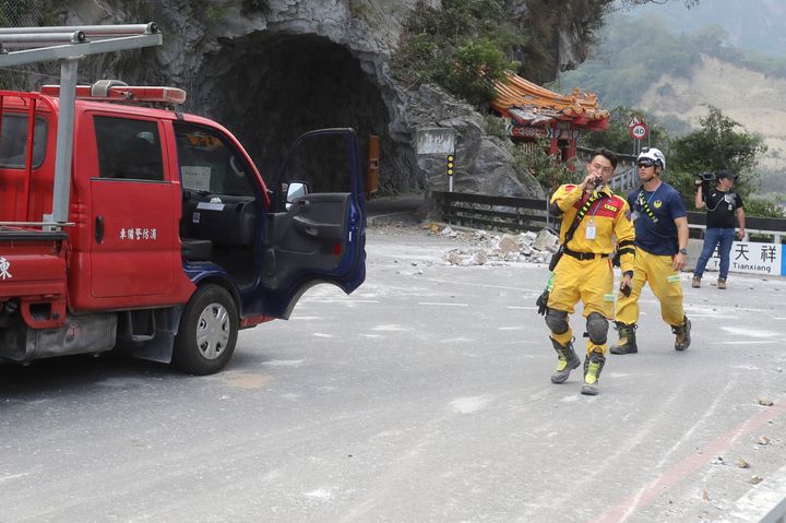 A firefighter regroup at the entrance of Taroko National Park in Hualien County, eastern Taiwan, on April 4, 2024.