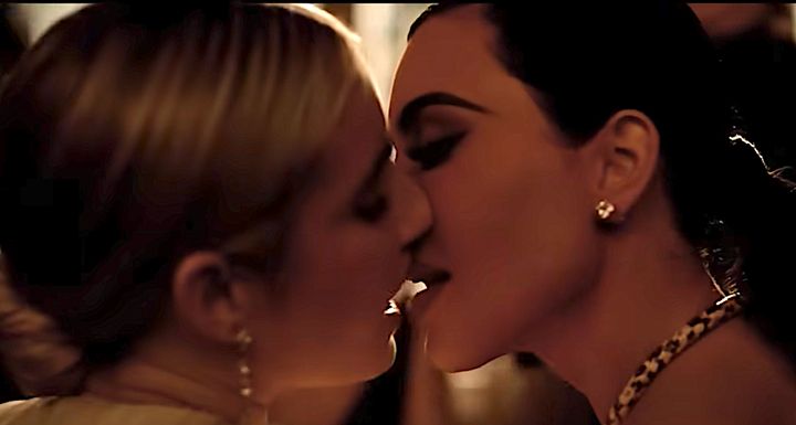 Emma Roberts, left, and Kim Kardashian kiss in "American Horror Story: Delicate Part Two."