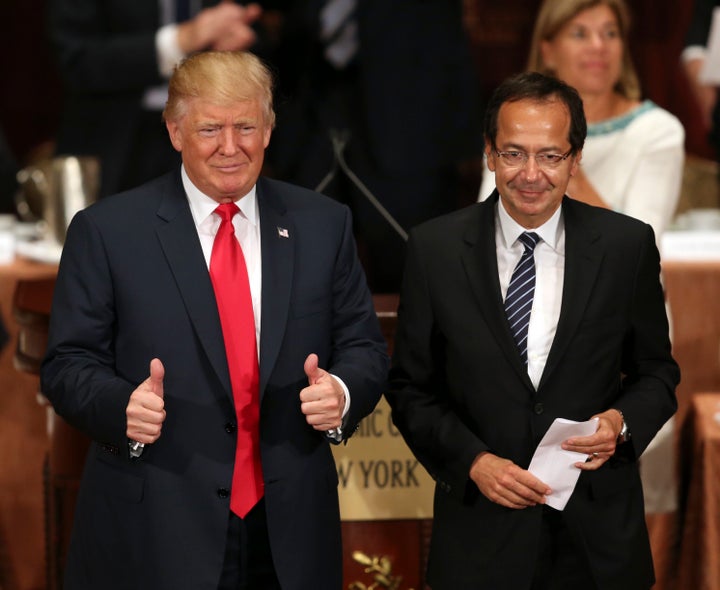 Republican presidential candidate Donald Trump gives the thumbs up while standing with John Paulson at a luncheon for the Economic Club of New York in New York on Sept. 15, 2016.