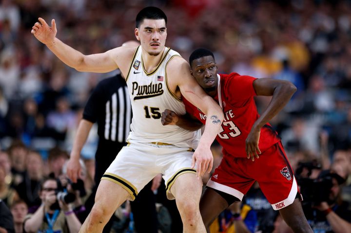 GLENDALE, ARIZONA - APRIL 06: Zach Edey #15 of the Purdue Boilermakers calls for the ball while defended by Mohamed Diarra #23 of the NC State Wolfpack during the second half in the NCAA Men's Basketball Tournament Final Four semifinal game at State Farm Stadium on April 6, 2024 in Glendale, Arizona. (Photo by Lance King/Getty Images)
