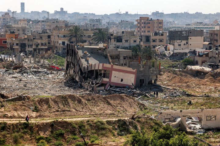 This picture taken on April 7, 2024 shows a view of a collapsed building in Khan Younis after Israel pulled its ground forces out of the southern Gaza Strip, six months into the devastating war sparked by the October 7 attacks. Israel pulled all its troops out of southern Gaza on April 7, including from the city of Khan Yunis.