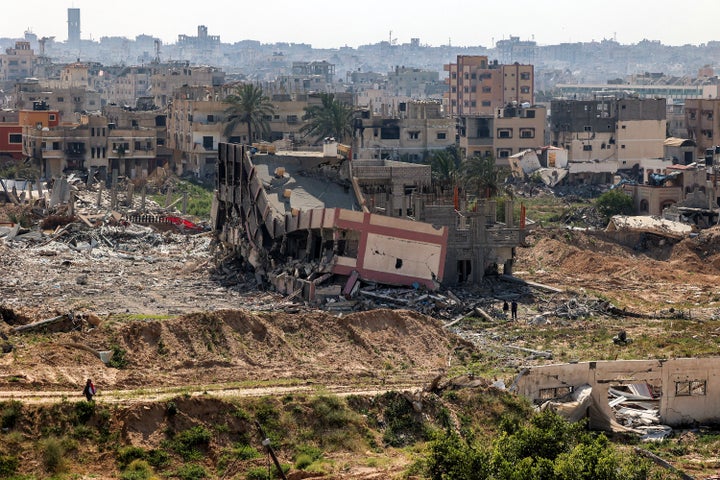 This picture taken on April 7, 2024 shows a view of a collapsed building in Khan Younis after Israel pulled its ground forces out of the southern Gaza Strip, six months into the devastating war sparked by the October 7 attacks. Israel pulled all its troops out of southern Gaza on April 7, including from the city of Khan Yunis.