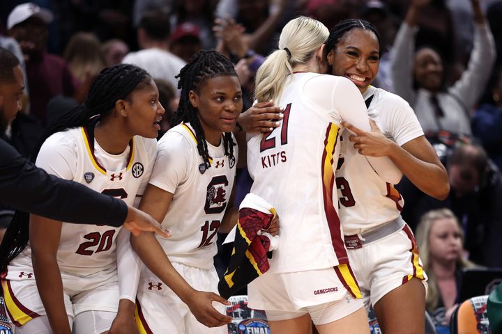 CLEVELAND, OHIO - APRIL 07: Bree Hall #23 and Chloe Kitts #21 of the South Carolina Gamecocks celebrate in the second half during the 2024 NCAA Women's Basketball Tournament National Championship game against the Iowa Hawkeyes at Rocket Mortgage FieldHouse on April 07, 2024 in Cleveland, Ohio. (Photo by Gregory Shamus/Getty Images)