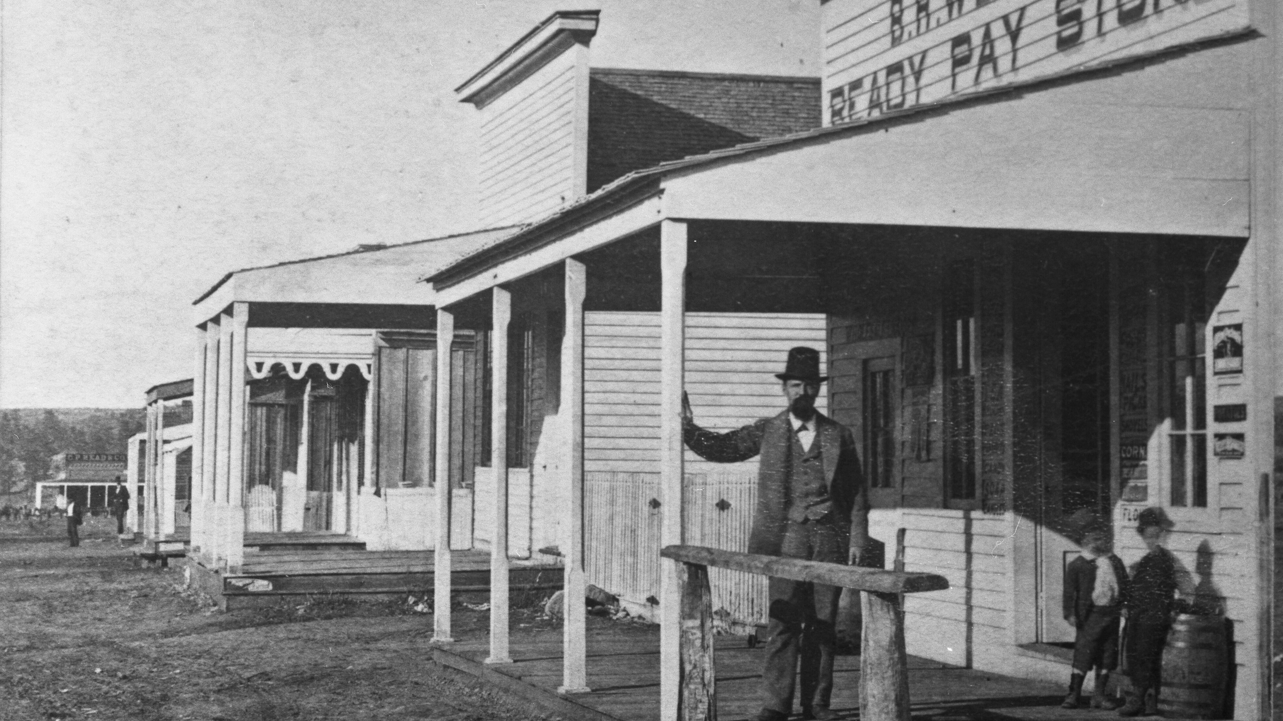 The B H Weaver Ready Pay Store selling groceries and liquors on Montezuma Street in Prescott, Arizona, USA, circa 1875. 