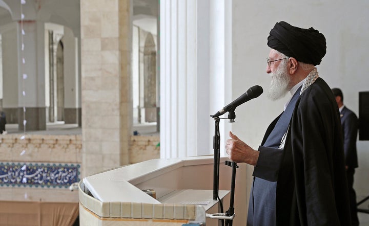 In this photo released by the official website of the office of the Iranian supreme leader, Supreme Leader Ayatollah Ali Khamenei delivers his sermon during Eid al-Fitr prayer ceremony marking the end of the Muslims holy fasting month of Ramadan, in Tehran, Iran, on April 10, 2024. Ayatollah Khamenei reiterated on Wednesday a promise to retaliate against Israel over the killings of Iranian generals in Syria.