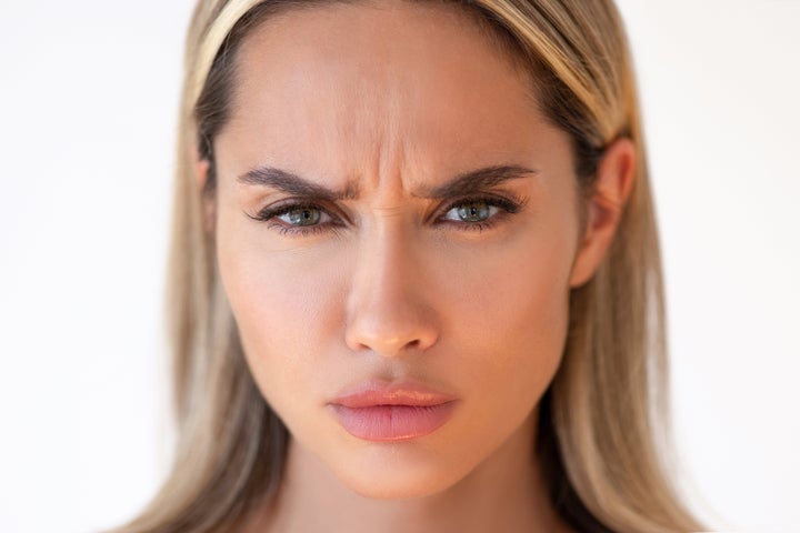 Portrait of woman with angry expression