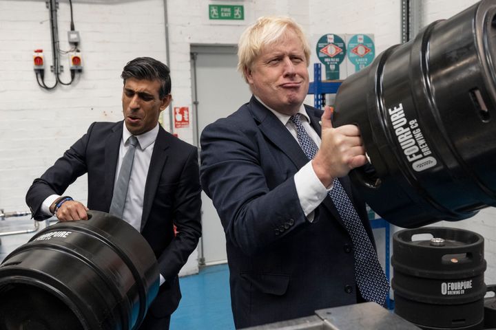 LONDON, ENGLAND - OCTOBER 27: British Prime Minister Boris Johnson and Britain's Chancellor of the Exchequer Rishi Sunak visit 'Fourpure Brewery' in Bermondsey on October 27, 2021 in London, England. Earlier in the day, Sunak presented the government's budget, and how to "deliver a stronger economy for the British people", to the House of Commons. (Photo by Dan Kitwood-WPA Pool/Getty Images)