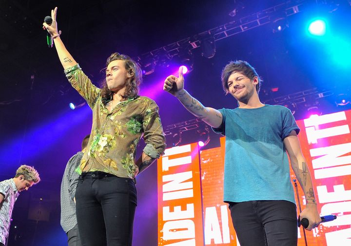 Harry Styles and Louis Tomlinson of One Direction perform on December 2, 2015 in San Jose, California.