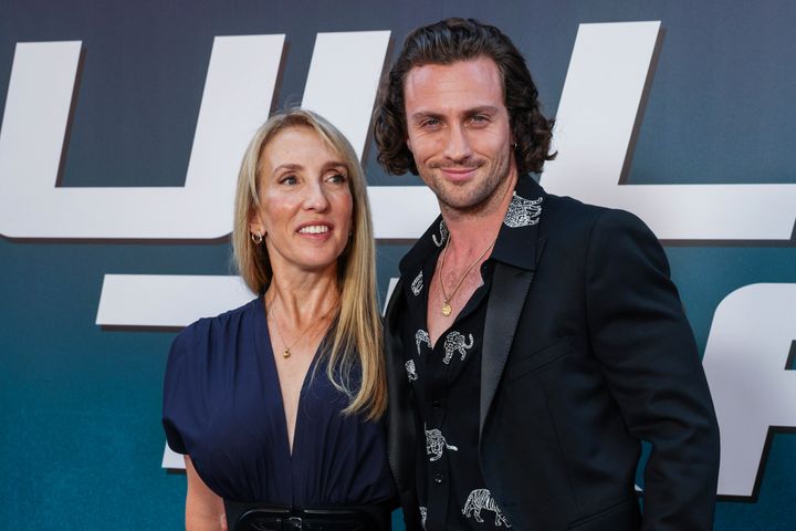 Sam Taylor-Johnson, left, and Aaron Taylor-Johnson attend the premiere of "Bullet Train" on July 18, 2022, in Paris, France.