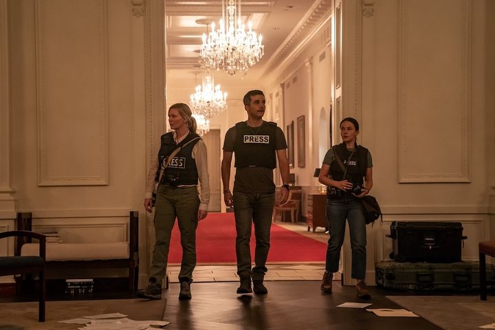 (Left to right) Kirsten Dunst, Wagner Moura and Cailee Spaeny portray war photojournalists in director Alex Garland's ill-conceived new film.