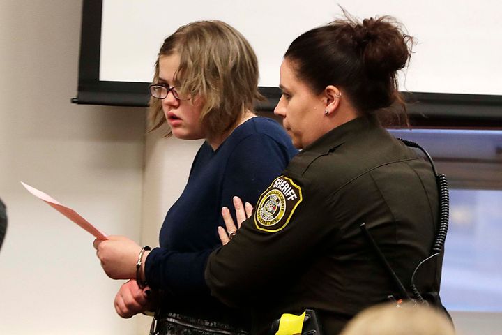 FILE- Morgan Geyser is escorted out of the courtroom following her sentencing on Feb. 1, 2018, in Waukesha, Wis. Geyser, one of two Wisconsin women who were sent to a state mental health facility after a 2014 stabbing attack on a sixth-grade classmate that they claimed was to appease the horror character Slender Man. (Rick Wood/Milwaukee Journal-Sentinel via AP, Pool)
