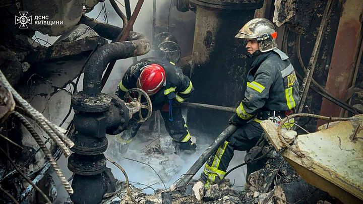 In this photo provided by the Ukrainian Emergency Service, emergency workers extinguish a fire after a Russian attack on the Trypilska thermal power plant in Ukrainka, Kyiv region, Ukraine, on April 11, 2024.