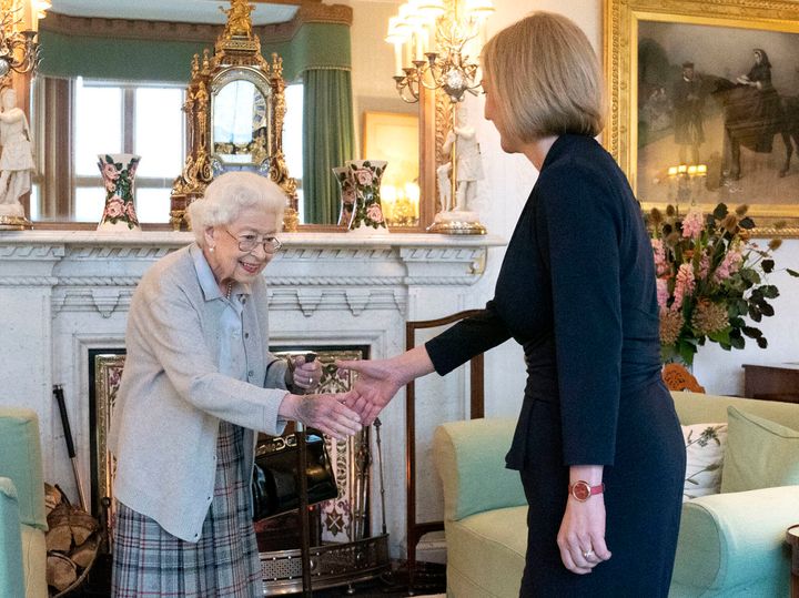Queen Elizabeth II welcomes Liz Truss during an audience at Balmoral, Scotland, on September 6, 2022.