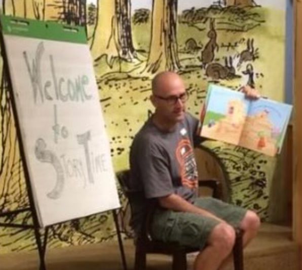 The author reads stories to kids at a bookstore in 2016.